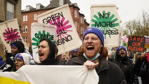 Protesters take part in a rally organised by the Cop26 Coalition in Glasgow