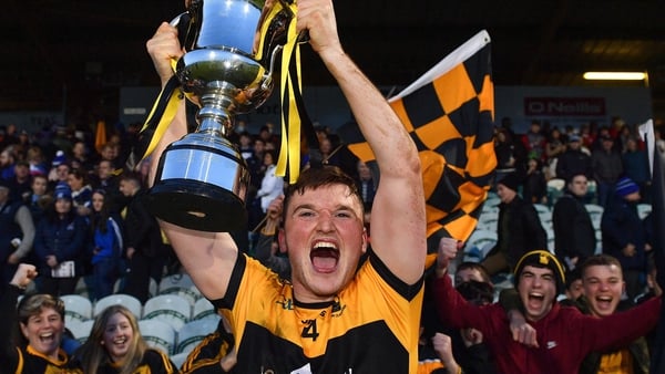 St Eunan's captain Niall O'Donnell lifts the trophy