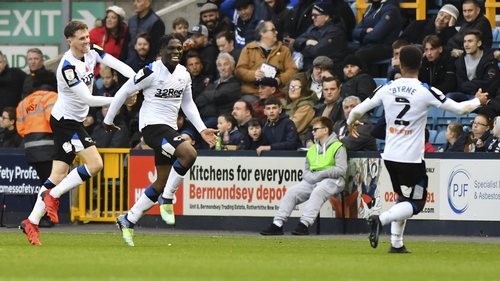 Festy Ebosele (C) celebrates with his Derby County team-mates after scoring against Millwall