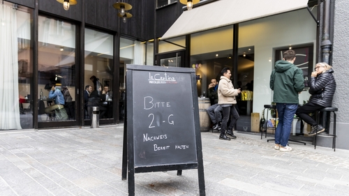 A sign outside a cafe in Innsbruck, Austria, asking for proof of vaccination