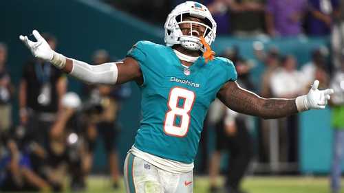 Jevon Holland of the Miami Dolphins celebrates after a game-ending interception against the Baltimore Ravens