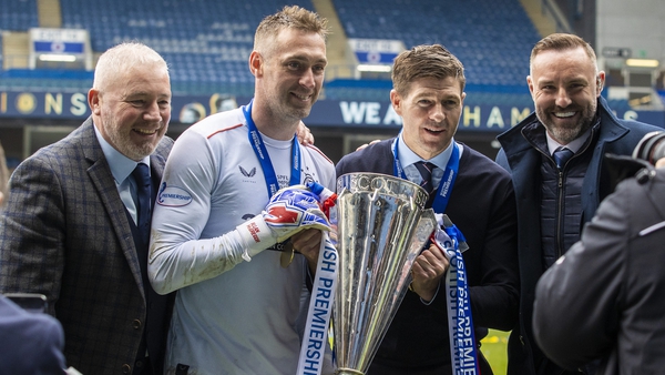 Former Rangers' player Ally McCoist (left) and Kris Boyd (right) with Allan McGregor and Steven Gerrard