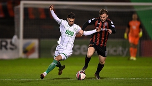 Danny Mandroiu of Shamrock Rovers in action against Conor Levingston of Bohemians