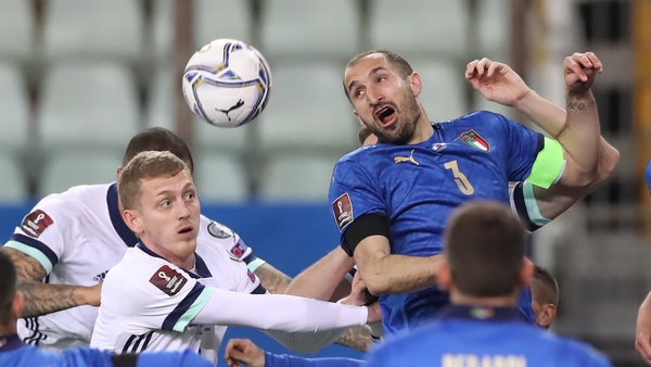 Giorgio Chiellini of Italy and George Saville battle for possession during the meeting in March