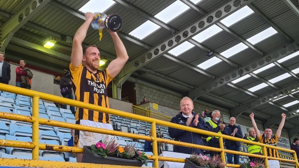 James Cash lifts the cup at Chadwicks Wexford Park