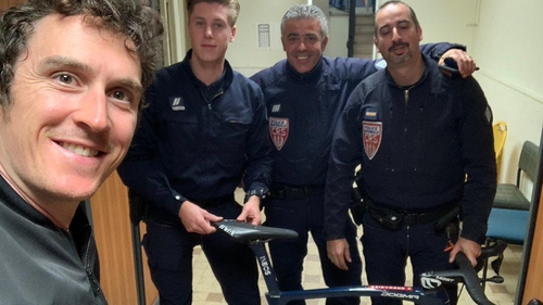 Geraint Thomas with police in Menton after recovering his bike