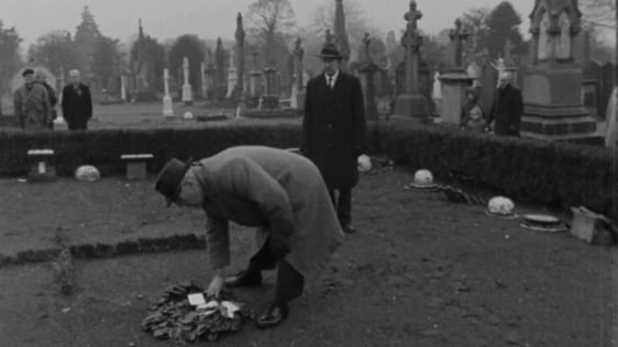 A wreath is laid on the grave of Rory O'Connor in Glasnevin Cemetery, 1966.