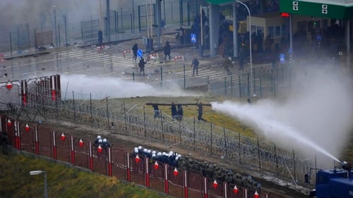 Polish forces use water cannon and tear gas the buffer zone between Belarus and Poland borders (Pic: Podlasie Police/Handout)