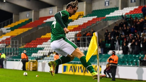 Ollie O'Neill celebrates his late goal. The victory moves Jim Crawford's side to within four points of the Swedes in Group F with a game in hand
