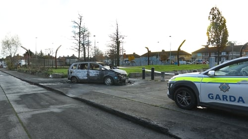 A burned out car near where gardaí are investigating Wednesday night's shooting incident (RollingNews.ie)