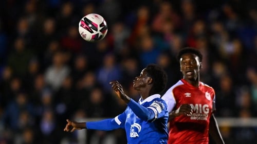 Junior Quitirna of Waterford in action against James Abankwah of St Patrick's Athletic