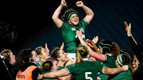 Ciara Griffin is held aloft by her team-mates after leading Ireland to victory against Japan