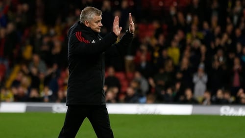 Ole Gunnar Solskjaer holds his hands up as he strides over to Manchester United fans to apologise for an abject performance