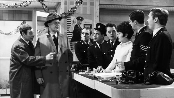 Z-Cars, 1967: New Detective Inspector played by Joss Ackland meets the staff. Behind the desk are from l to r, Steve Yardley, David Daker, Joseph Brady, Pauline Taylor, James Ellisand Bernard Holley. (Photo by Harry Todd/Fox Photos/Getty Images)