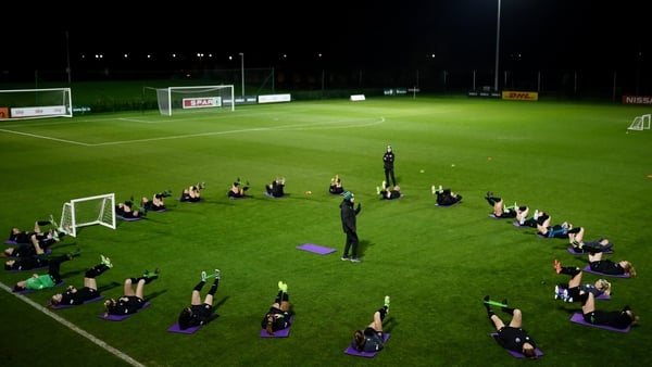 Republic of Ireland go through their stretches during a training session in Abbotstown.