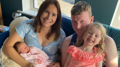 Tracey Malee with her family - she is overjoyed that New Zealand borders will reopen next year