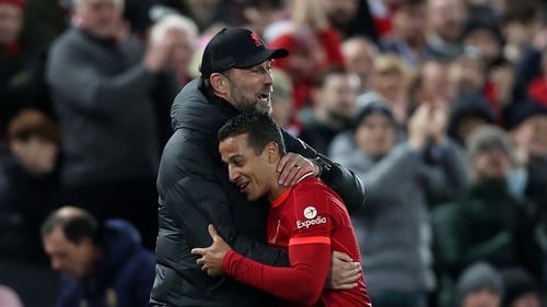 Thiago Alcantara is congratulated by Jurgen Klopp after being substituted shortly after his goal