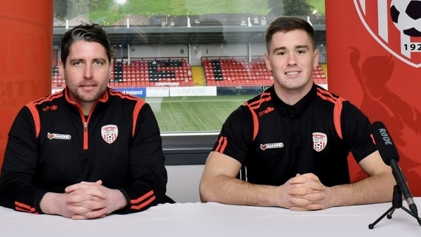 Ruaidhri Higgins (L) with new signing Brian Maher