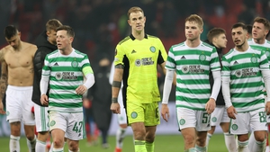 Crestfallen Celtic players trundle off the pitch after the final whistle