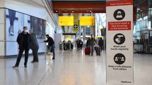 A public heath notice at Heathrow Airport in London. Britain is one of several countries to today confirm further Omicron cases (file image)