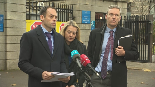 Anne Walsh's son, Stephen (L) speaking to reporters outside the High Court