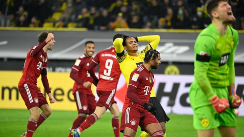A controversial penalty, finished by Robert Lewandowski, gave Bayern Munich a 3-2 win against Dortmund