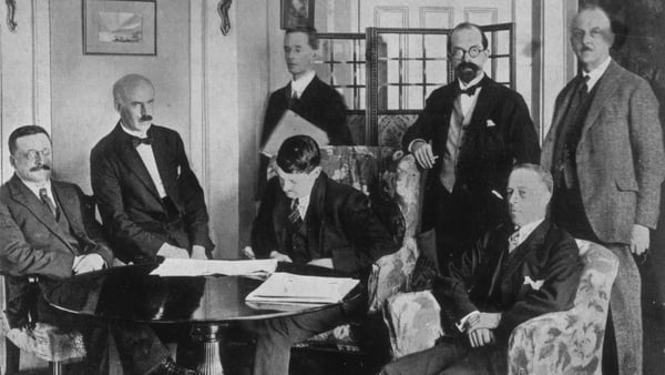 Irish delegates signing the Treaty