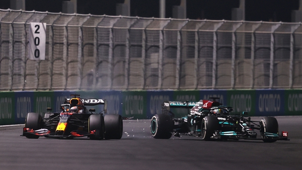 Max Verstappen (L) and Lewis Hamilton collide in Saudi Arabia
