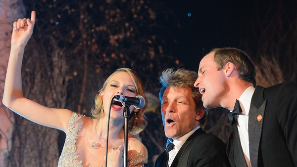 Taylor Swift, Bon Jovi and Prince William sing Livin' On A Prayer at the Centrepoint Gala Dinner at Kensington Palace in London, on November 26, 2013.