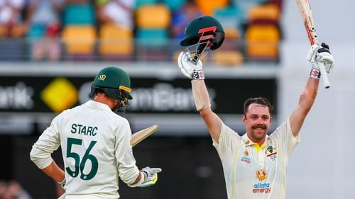 Australia's Travis Head celebrates his century during day two of the first Ashes cricket Test match