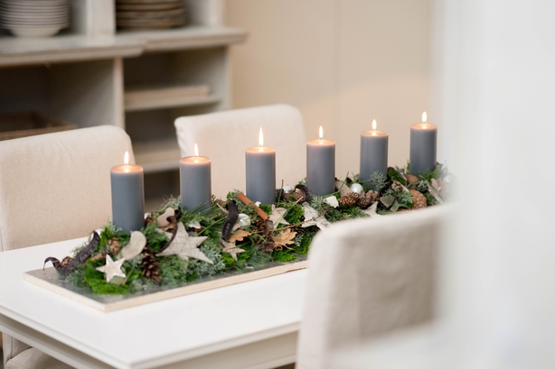 Christmas grey candle tablescape (Michal Kowalski/Blooming Haus/PA)