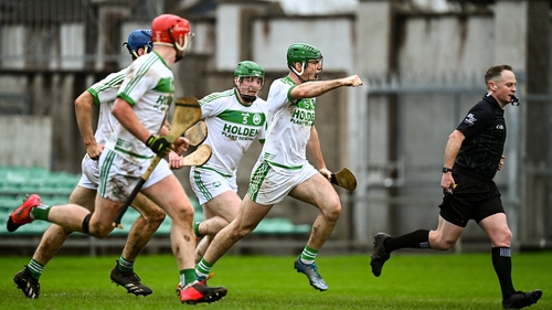 Shamrocks Ballyhale players, including Eoin Cody, celebrate after scoring their side's third goal
