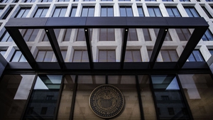 The FOMC announced it will phase out its stimulus measures more quickly