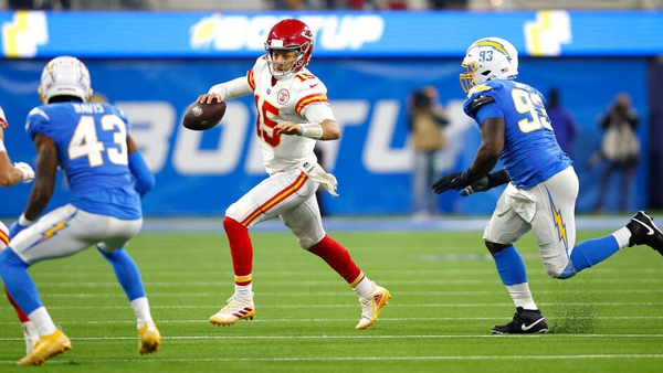 Kansas City Chiefs quarterback Patrick Mahomes #15 gets away from the Los Angeles Chargers defence