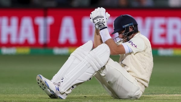 Joe Root down injured after being hit by the ball