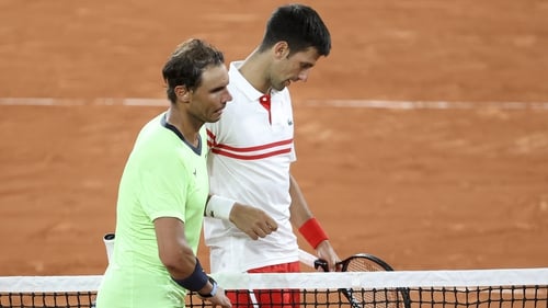 Rafael Nadal (L) with Novak Djokovic.