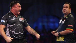 Gerwyn Price (L) had a ding-dong battle with Kim Huybrechts