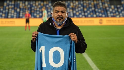 Hugo Maradona, pictured last May posing with a Napoli shirt signed by his brother Diego.