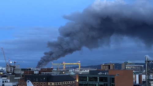 Thick black smoke billowed high into the sky throughout the afternoon