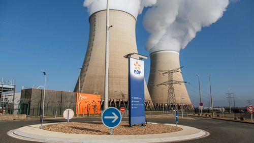 Cooling towers release water vapour at the Nogent nuclear power plant, operated by Electricite de France