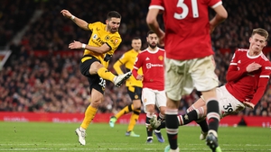 Joao Moutinho shoots to score at Old Trafford