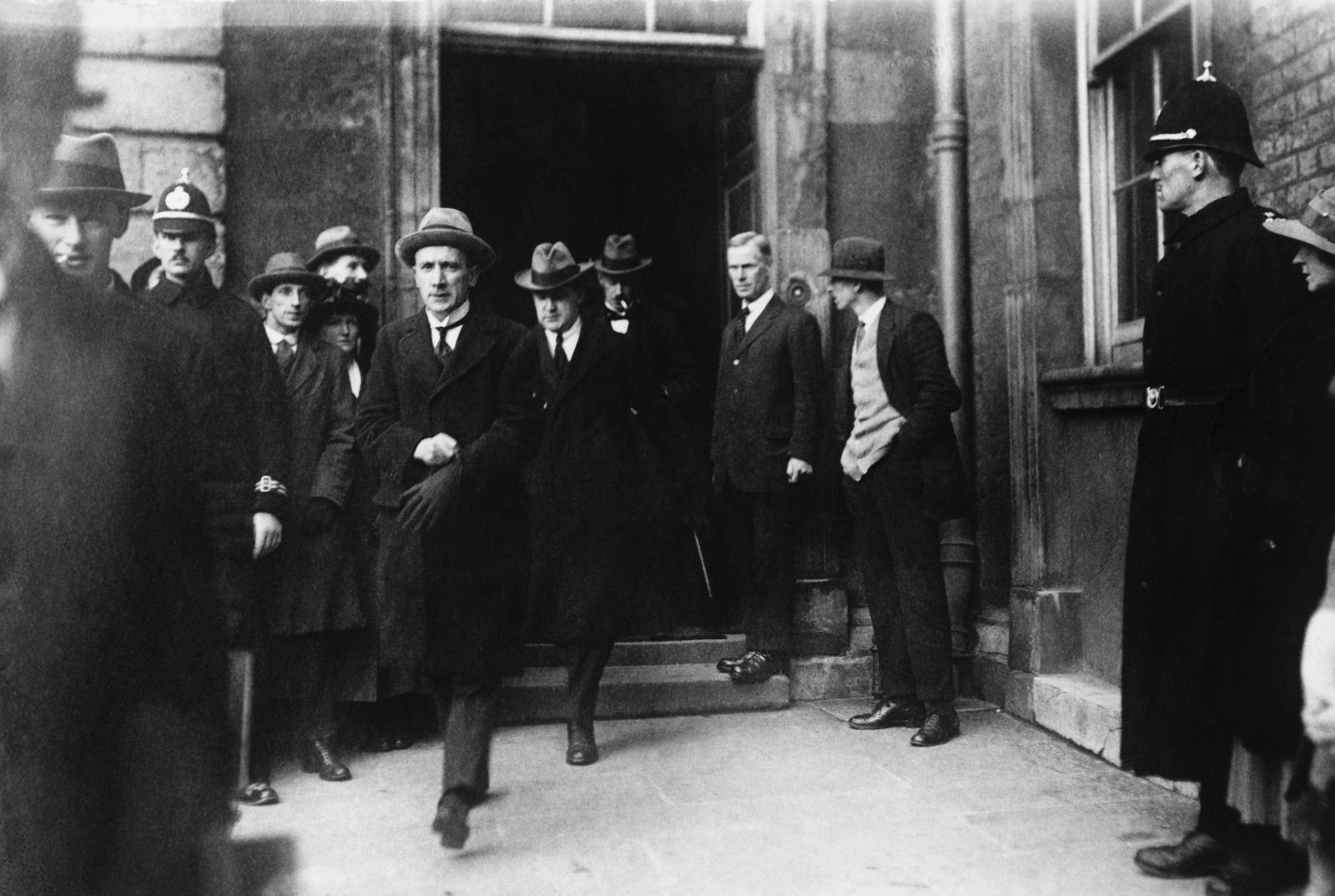 Image - Michael Collins (centre) and Kevin O'Higgins (putting on glove) arriving at Dublin Castle for the formal transfer of power. Photo: © Hulton-Deutsch Collection/CORBIS/Corbis via Getty Images