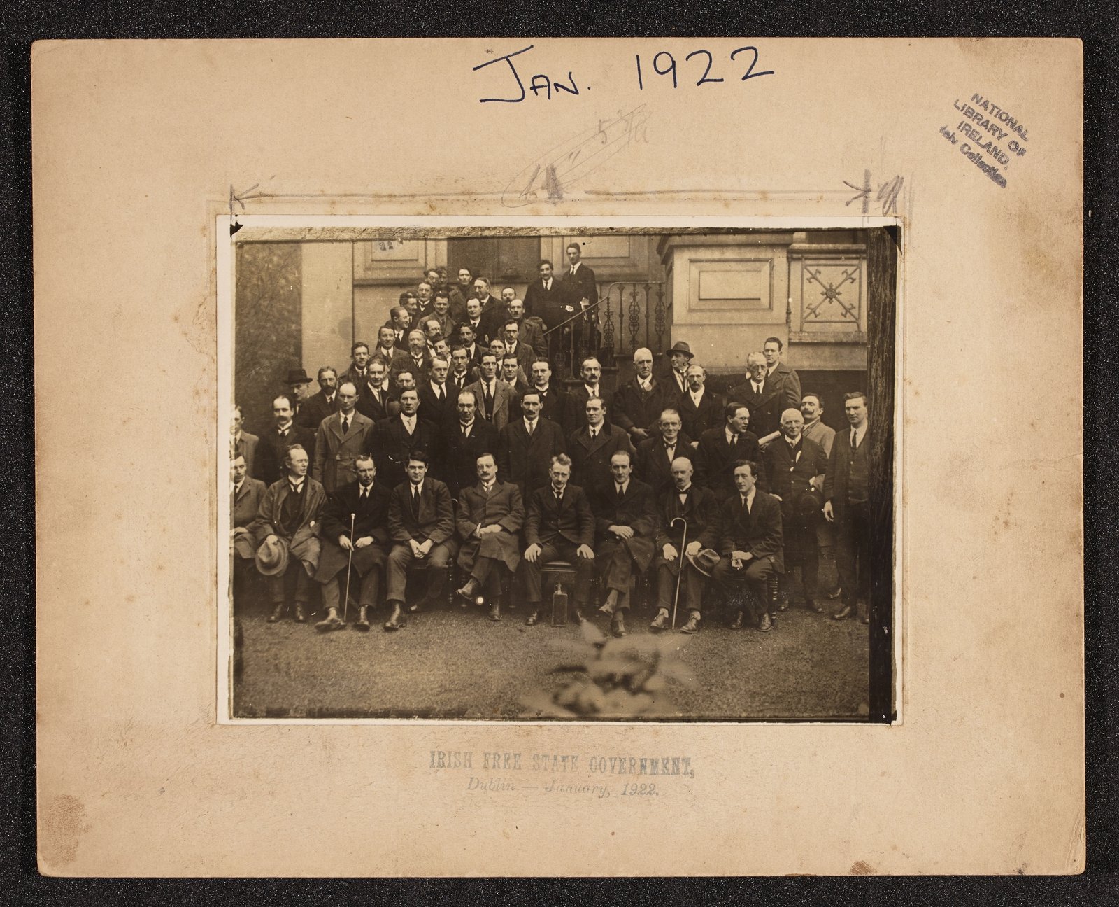 Image - The new provisional government of Ireland, photographed with supporters in January 1922. Image courtesy of the National Library of Ireland