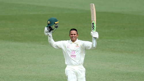 Usman Khawaja of Australia celebrates after reaching his century during day two of the fourth Test