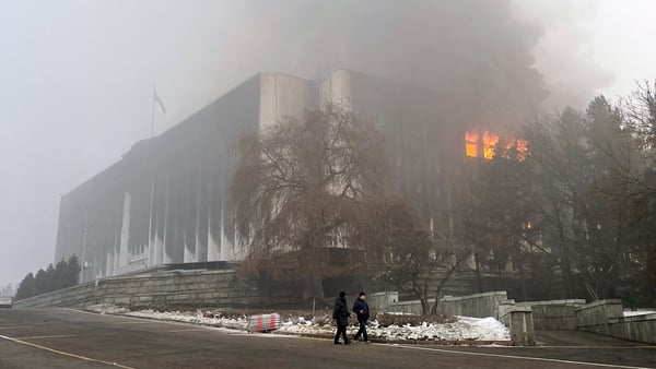 The mayor's office which was set on fire during unrest in Almaty