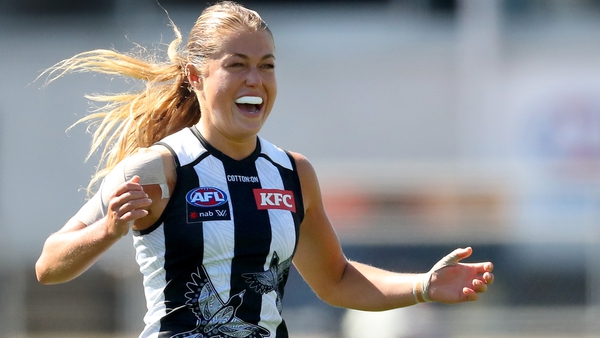 Sarah Rowe celebrates his opening goal for the Pies