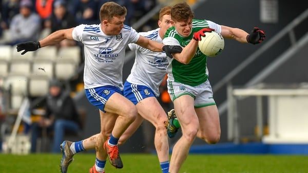 Fermanagh's Daragh McGurn breaks through the challenge of Conor McCarthy