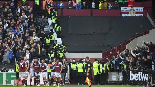 West Ham fans celebrate after their opening goal