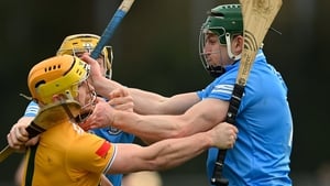 Conor Johnston of Antrim (L) squares up to Dublin's James Madden.
