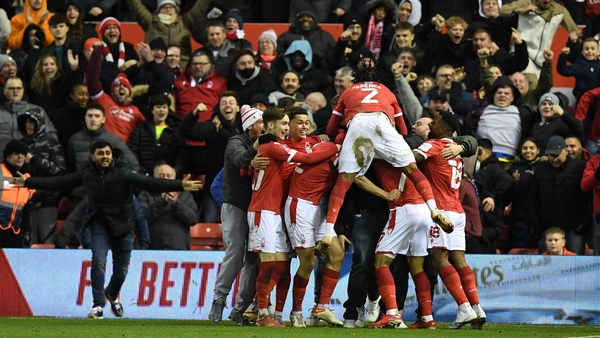 Nottingham Forest fans and players celebrate Lewis Grabban's winning goal